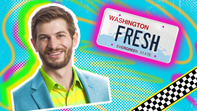Image of Mike in a neon blue and yellow suit next to a license play that says "FRESH"
