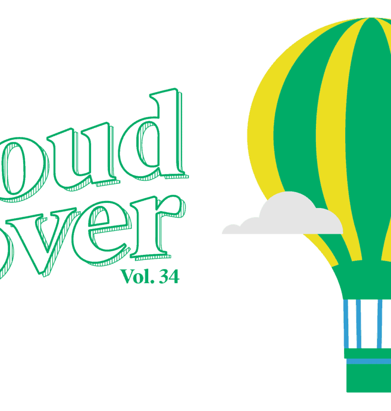 Illustration featuring the text 'cloud cover Vol. 34' in green, stylized lettering on the left. On the right, a green and yellow striped hot air balloon with a blue and white basket is floating among small white clouds on a plain white background.