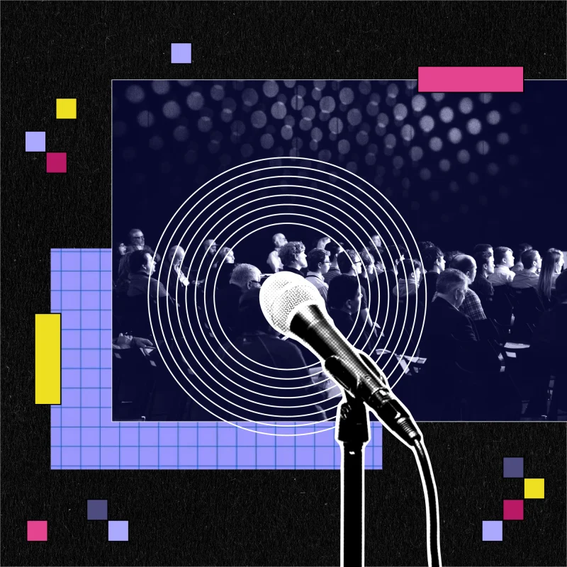 A microphone in the foreground with an audience seated in the background, overlaid with concentric circles and colorful geometric shapes on a dark textured background.